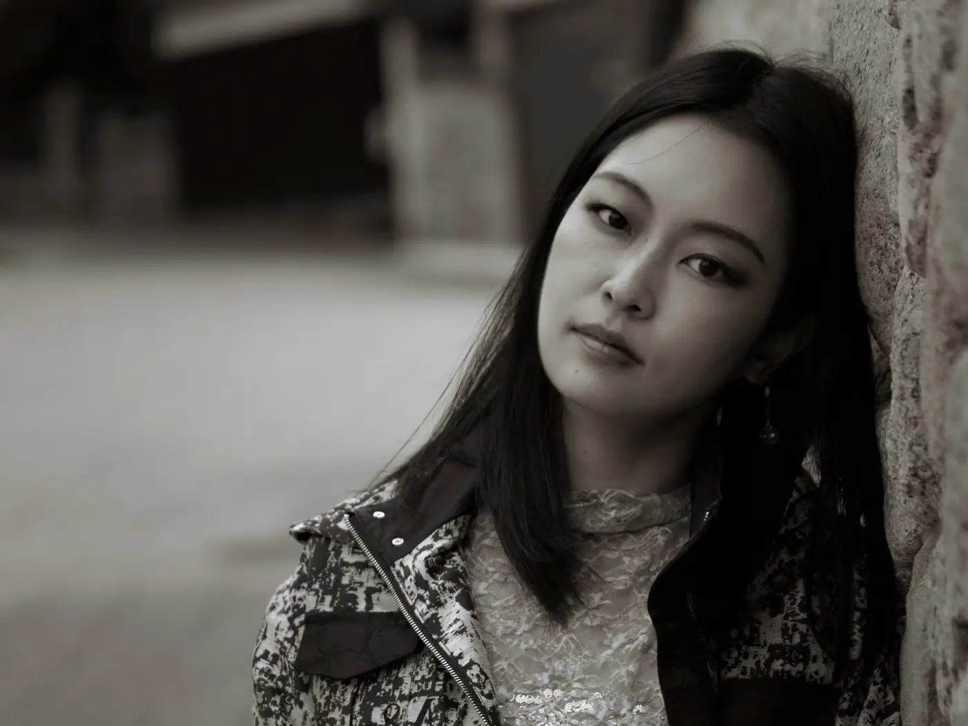 Portrait against stone wall